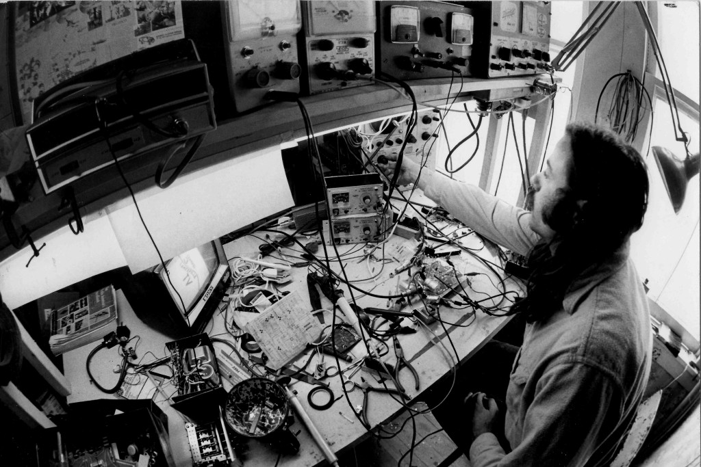 Chuck Kennedy at his work bench - 1973: Photo by John Dominis